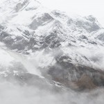 An avalanche runs down the Annapurna South. The snow and ice, heavy with rainwater, will sluggishly reach the edge of the South Annapurna Glacier